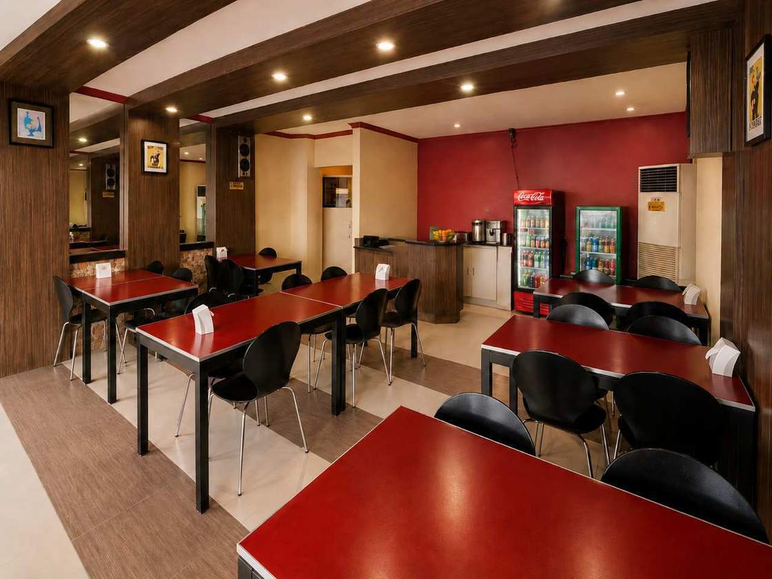 Dining room interior at Oyster Plaza Hotel